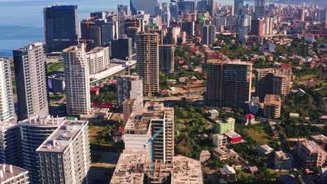 construction industry and tourism background – building up new quarters of batumi seaside resort city in georgia