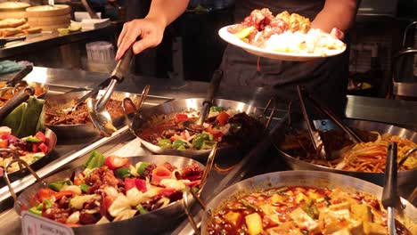 food being served at a market stall