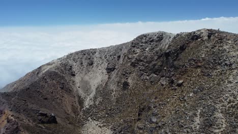 Aerial-fly-in-to-extinct-volcano-crater-on-summit-of-Guatemala-mountain