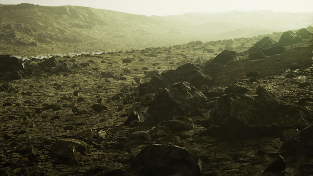 Exploring a barren alien landscape under a hazy yellow sky