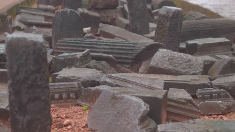 ancient ruins scattered outdoors, capturing historical intrigue and mystery