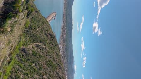 Vertical-Pan-on-Javea-Bay-from-Cabo-San-Antonio,-Spain