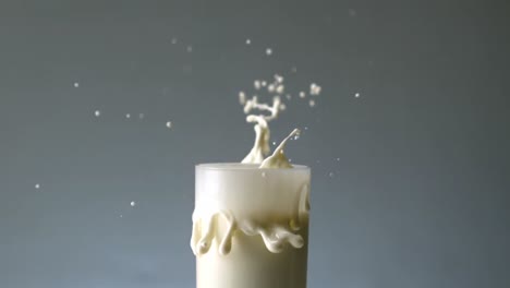 Cookie-falling-in-glass-of-milk