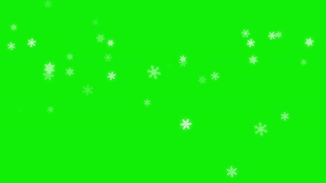 animación de 4k de copos de nieve que caen (fondo verde para el uso de la tecla de croma)