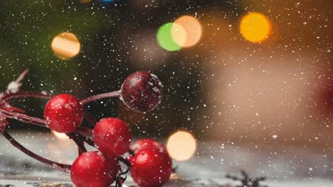 animation of snow falling over christmas holy branch