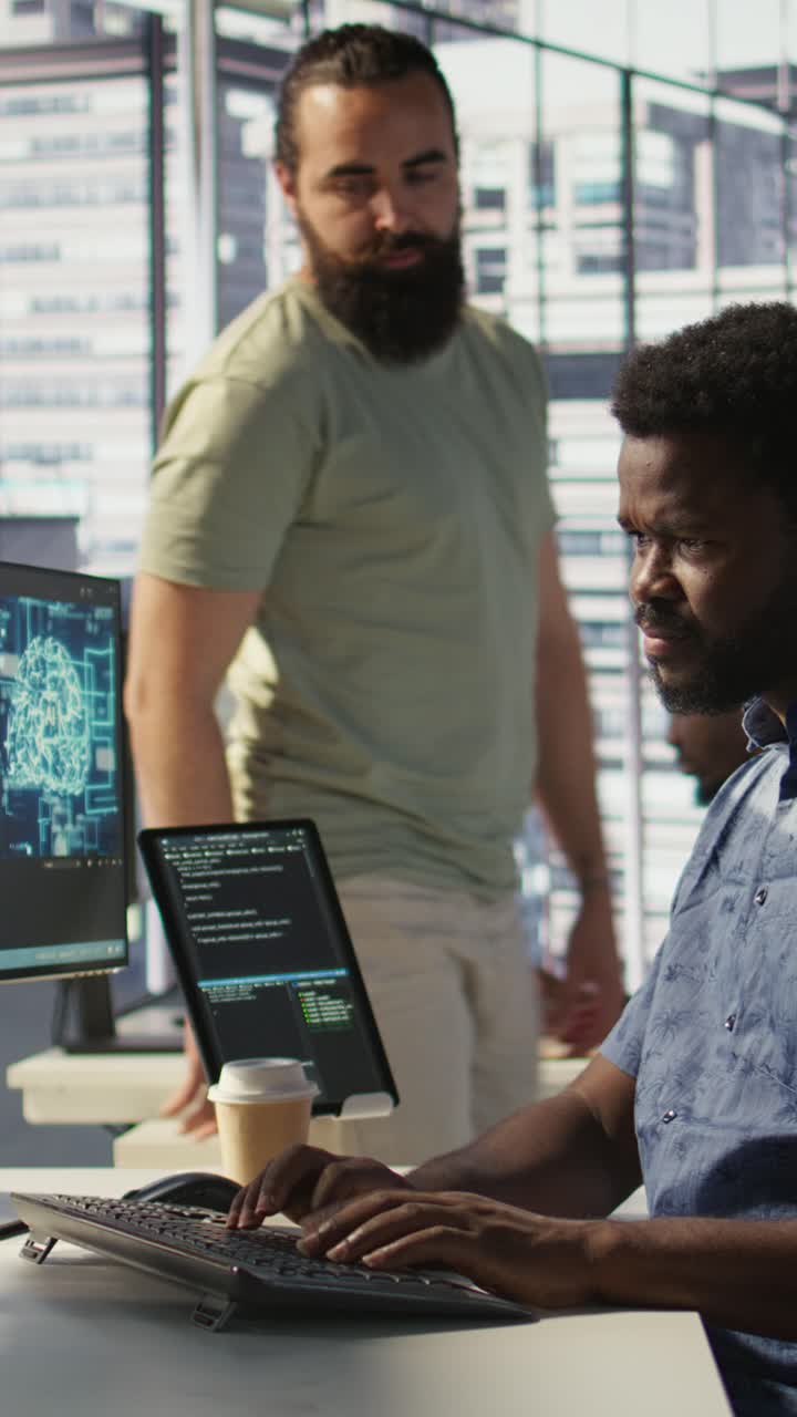 Vertical video Manager coming to check on progress done by programmer creating AI