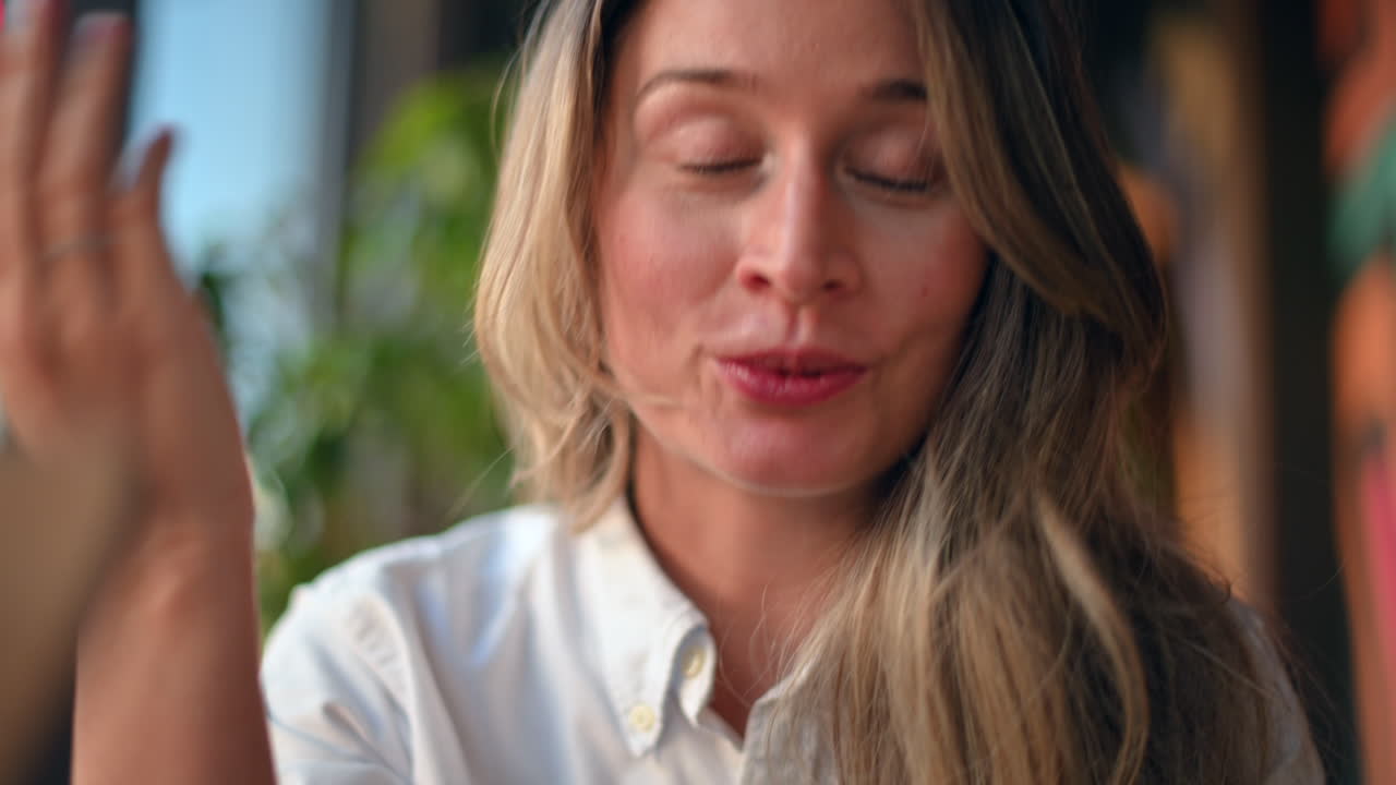 Happy woman smiling in a restaurant