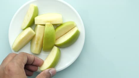 green apple slices on a plate