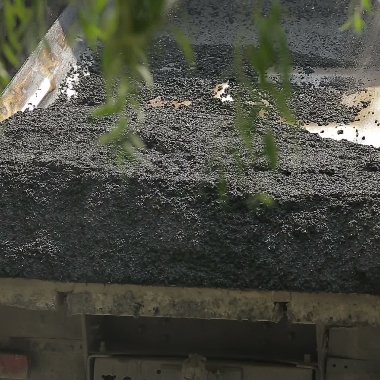 Truck Unloading Asphalt