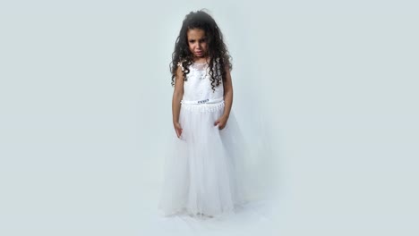 Cute-little-girl-wearing-white-princess-dress-crying