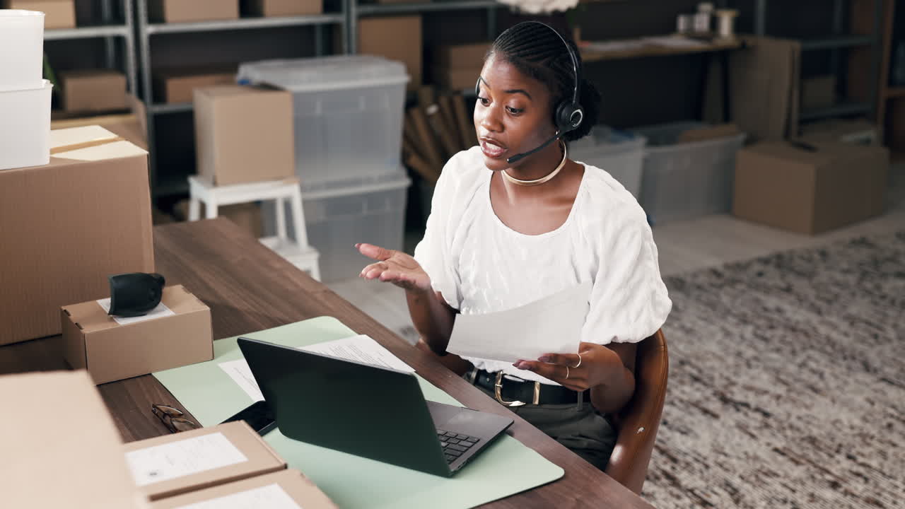 Young Black Woman on Video Call in E-commerce Office