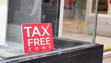 tax free zone sign in a store window