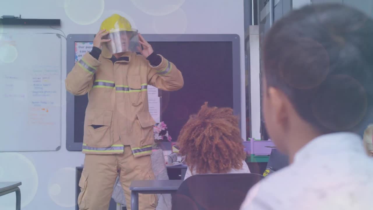 Animation of lights over caucasian fireman making presentation to class of diverse pupils