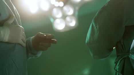 surgeons preparing for surgery