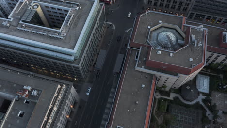 AERIAL:-Slowly-turning-around-street-over-Berlin-Central-with-Car-Traffic