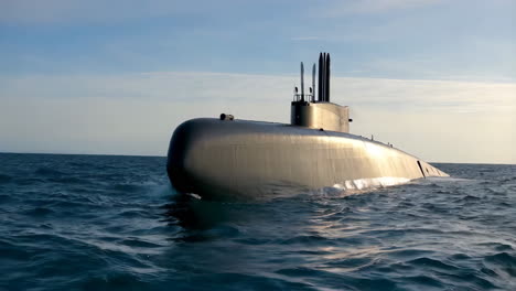 submarine surfacing in the ocean