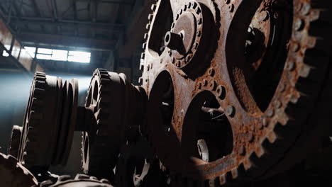 rusty gears in abandoned factory
