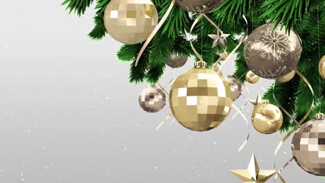Animation-of-snow-falling-over-gold-christmas-baubles