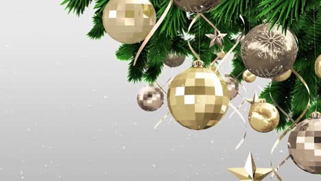 animación de la nieve cayendo sobre las bolas de oro de navidad