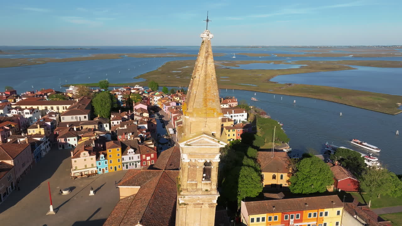 Aerial drone view of the Church of Saint Martin Bishop in Burano Island, Italy