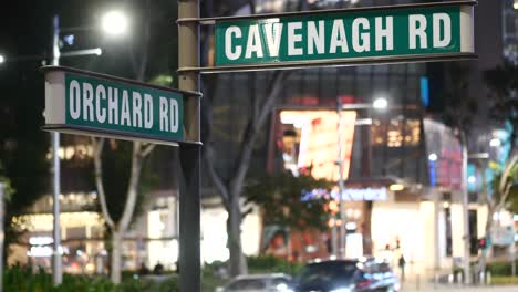 orchard road signn and buildings