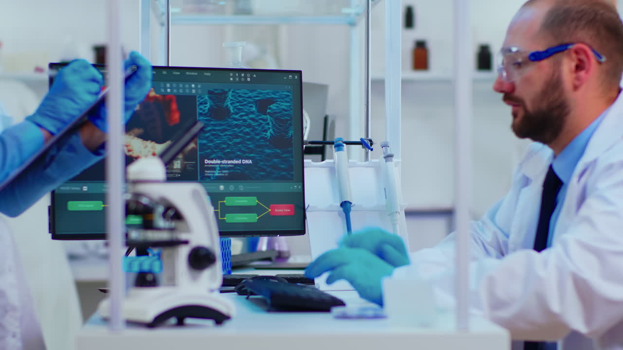 Team of multiethnic positive scientists working in chemistry laboratory