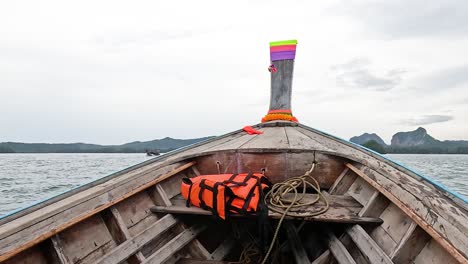 boat travels through scenic krabi waters