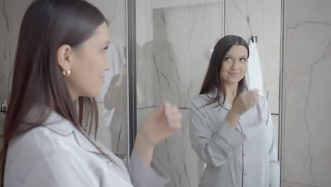 woman getting ready in the bathroom