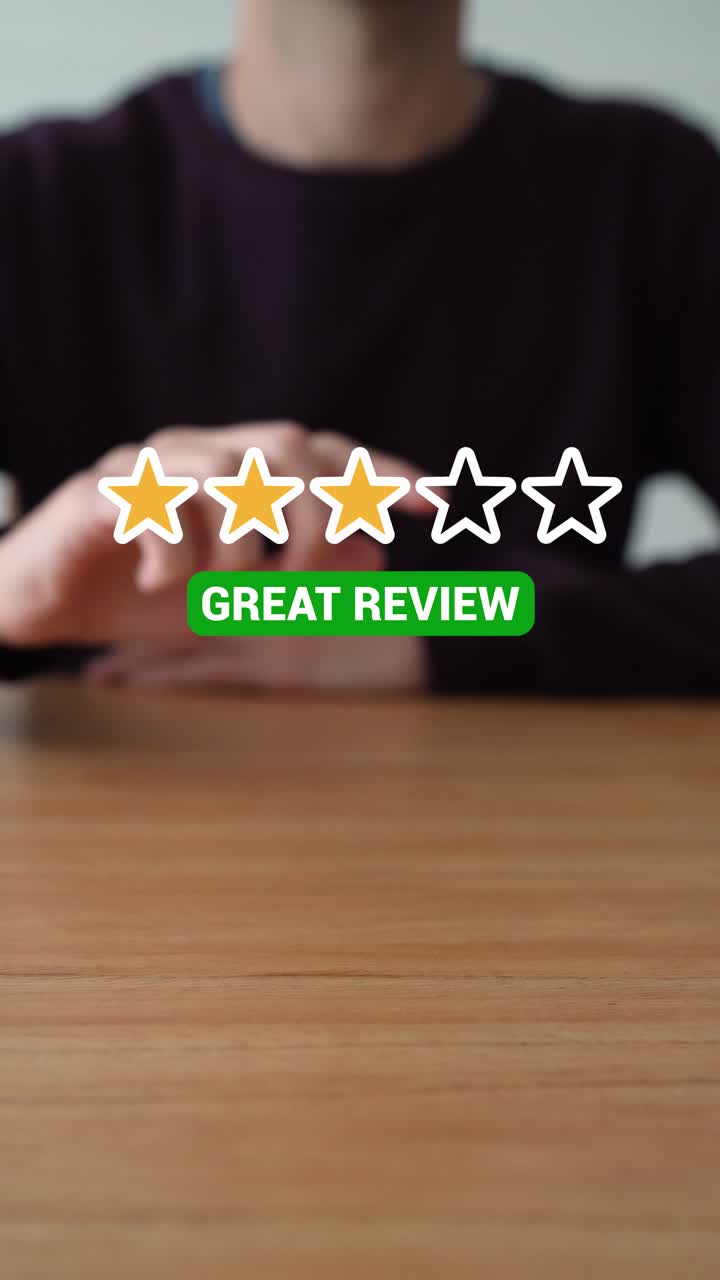 Man Taps On Great Review, Giving 5 Stars. - vertical shot