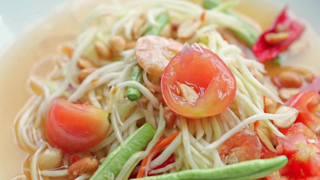 Green Papaya Salad with Shrimp, Tomato, and Rice Noodle Spicy Thai Dish